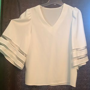 White choir sleeve blouse.